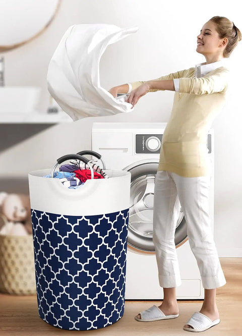 Woman using Gigantic 115L Collapsible Laundry Basket With Tall Aluminum Soft Grip Handles Waterproof Hamper Bag in laundry room