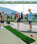 Three people playing on Indoor Outdoor Putt Putt Golf Game Set with two adjustable putters, cups, flags, and putting green