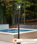 Inversee Outdoor Solar Post Light With 3 Mount Options shown by a poolside, black metal and glass, requires 2 hours of sunlight