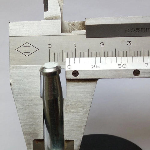 Caliper measuring the stem diameter of Two Inch Stem Caster Wheels Set Of Five With Eight Millimeter Or Five Sixteenth Inch Stem Diameter.