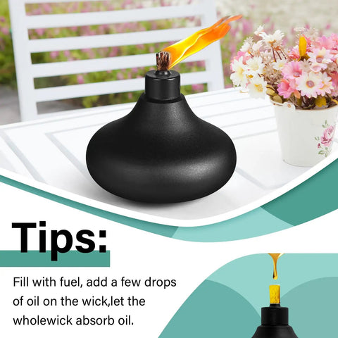 Black metal torch from Six Pack Metal Table Top Torches For Outdoor Use Citronella Fueled Refillable Flame Lights With Wicks And Covers Garden Decor Patio Party Lanterns Landscape Lighting DIY Friendly, displayed on a table