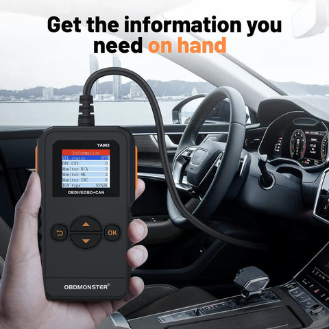 Universal OBD II Scanner for All Cars, Engine Fault Code Reader and CAN Diagnostic Tool held inside a car interior.