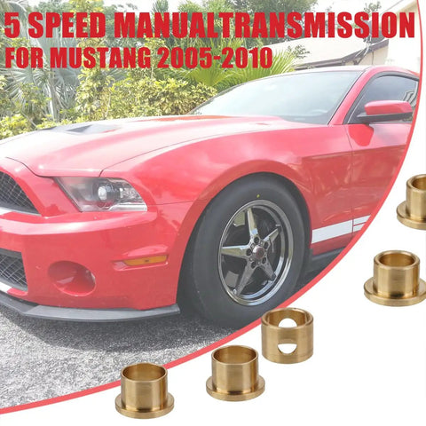 Five Piece Shifter Bushing Kit Direct Fit For Ford Mustang 2005 2010 TR3650 T5 WC Bronze Bushings Delivers Smooth Shifts And Tight Gear Feel For V6 And GT Durable Bronze Construction, bronze shifter bushings beside a red 2005-2010 Mustang