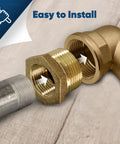 Close-up of brass NPT bushing, 1-1/4 in male x 1 in female, hex-head, lead-free brass, paired with gray threaded pipe