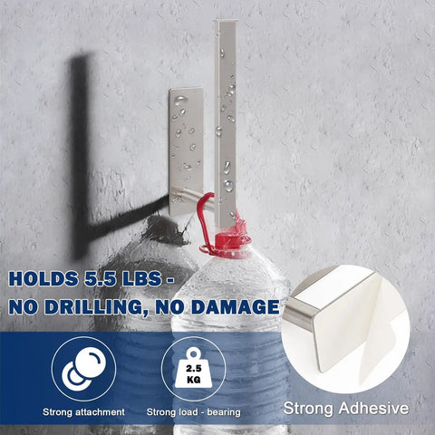 No Drill Self Adhesive Towel Holder 9 Inch Stainless Steel Bar In Brushed Gold Finish mounted on wall holding weight.