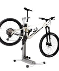 Bike Balance Trainer And Repair Stand Combo For Cyclists with mountain bike mounted on aluminum repair stand, 275 lb capacity.
