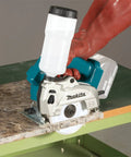 18V Cordless Wet and Dry Masonry Saw With Beefed-Up Brushless Motor, AWS Capable, being used on a tile surface