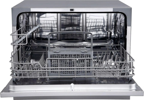 Interior view of Compact Countertop Dishwasher Featuring Stainless Tub And Seven Quick Wash Options Handles Six Place Settings No Stress In Tight Spaces Energy Star Certified.