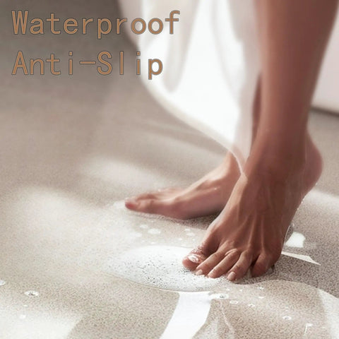 Person standing on wet surface coated with Epoxy Floor Paint With Colored Sand Finish And Imitation Marble Look, non-slip, waterproof.