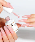 All In One Rubber Base Gel For Nails 4 In 1 Base Coat Foundation Gel Nail Repair And Strengthener Nude Pink UV 15ml applied on nails