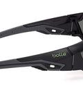 Side view of Shop Ready Wrap Around Safety Glasses Featuring Anti Scratch Lens Coating And Polarized Grey Tint For All Day Grind Universal Fit Grey Black Frame Cushioned Temples Secure Fit Bridge.