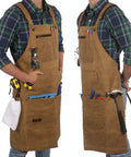 Kickass Heavy Duty Waxed Canvas Woodworking Apron For Men Featuring Boss Level Pocket Layout, dual hammer loops and tool pockets.