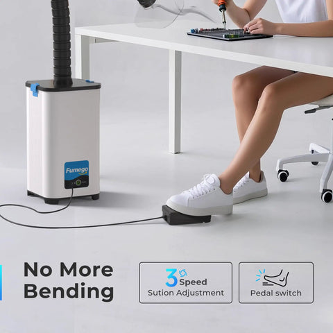 Nail Salon Fume Extractor With 130W Motor 260m3/h Air Flow Pedal Switch next to person soldering electronics on table.