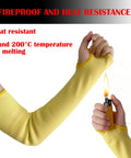 Tough As Nails Double Ply Kevlar Arm Sleeves Cut And Heat Resistant Ergonomic Knit Fit With Thumb Slots Perfect For Welding Mechanics Gardeners 18 Inch Yellow Includes 2 Pair Bundle showing heat resistance with hands and lighter.
