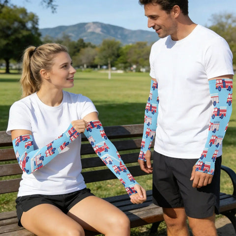 Stay Fresh With These Dope Cooling Arm Sleeves Shielding Bold Tattoo Ink Under Blazing Sun While You Crush Cycling Or Fishing Trips Quick Drying Stretch Polyester Delivers Solid UV Protection Daily worn by couple outdoors.