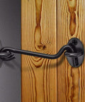 Built Tough 2 Pack Gate Hook Latches For Shed Doors Garden Gates And Cabinet Windows Rust Proof Stainless Steel Design with a black latch mounted on wood.
