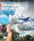 Person holding remote control with blue F4U Corsair in sky, Brushless RC Plane With 4 Channel Remote Control Aerobatic 2.4 GHz Aircraft
