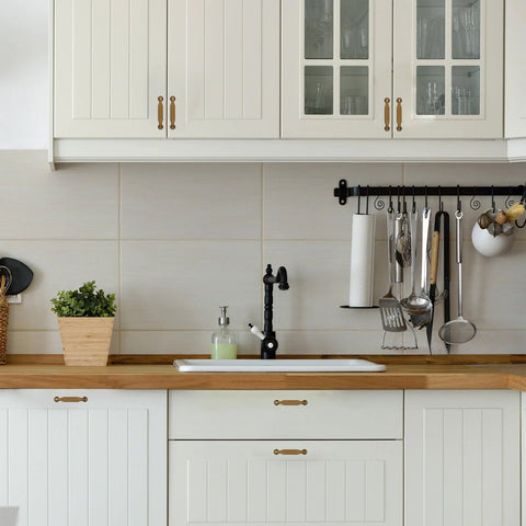 Antique Brass Cabinet Pulls 3-3/4 Inch 96mm 10 pack installed on white kitchen cabinets and drawers, elegant cabinet hardware