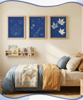 Bedroom with framed cyanotype prints from Dope Sun Print Cyanotype Kit With 30 Sheets Of Paper And Acrylic Panel