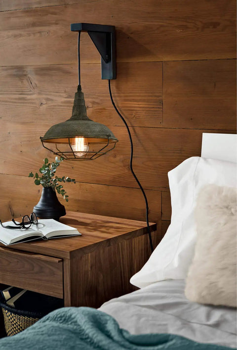 Farmhouse Plug In Pendant Light With 16 Feet Hanging Cord And Wire Cage Shade In Dark Charcoal Gray Finish in bedroom setting