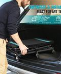 Electric Hydraulic Lift Table Built Dang Tough With Hella Smooth Operation And Straight Up Heavy Duty Aluminum Platform for loading in a car trunk.