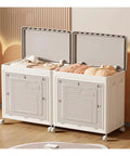 No Drama Foldable Storage Bins With Lid And Wheels 2 Pack Extra Tall Capacity Heavy Duty in modern room showing blankets inside.