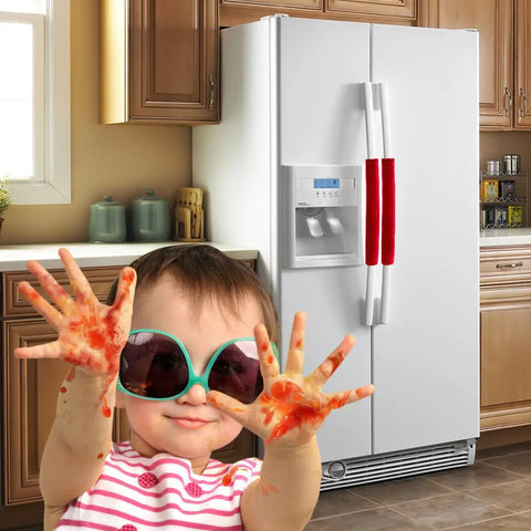 Five Piece Velcro Refrigerator Door Handle Covers In Big Red Easy Adjustments on fridge, child with messy hands in foreground