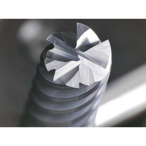 Close-up of 1/4 inch shank carbide end mill, 6-flute square cutter for hard steel milling