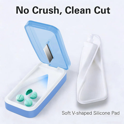 Open blue pill cutter with removable silicone liner, showing pills inside, emphasizing no crush clean cut feature.