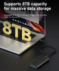 Blazing 80Gbps M.2 Nvme Ssd Enclosure with 8TB capacity, connected to laptop, showcasing fast data storage capabilities.