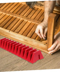 Space Saving Wrench Rack Organizer For Garage And Workshop 12 Piece Tool Organizer Tray Labeling Wrench Storage Holder To Speed Up Finding The Right Tool Heavy Duty Wrench Sorter And Wall Mount, red holder on floor with assembly task in background.