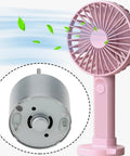 5.9V RF-310T-11400 Mini DC Motor with 22mm shaft and 24mm diameter powering a small pink handheld fan