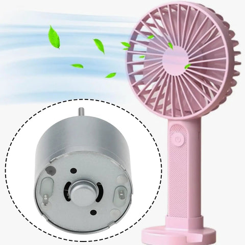 5.9V RF-310T-11400 Mini DC Motor with 22mm shaft and 24mm diameter powering a small pink handheld fan