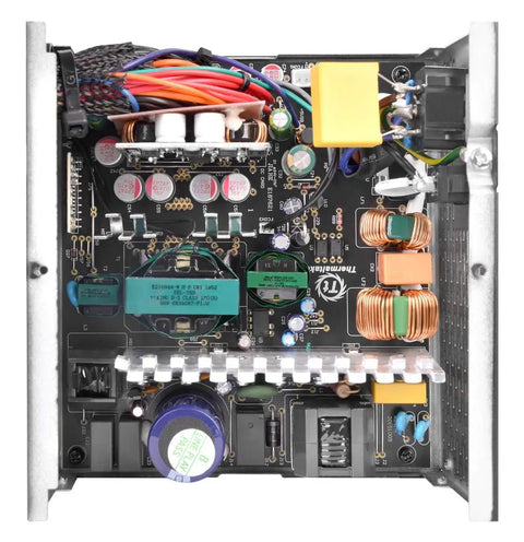 Internal view of 600W 80 Plus Gold Non Modular ATX Power Supply With Ultra Quiet 120mm Fan SLI And Crossfire Ready Continuous Power