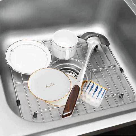 Double Bowl Kitchen Sink Protector Grid 304 Stainless Steel Universal Kitchen Sink Grid Bottom Rack Guard Keeps Your Sink Scratch Free Centered Drain 13.2 X 11.6 X 1.25 Inches Rubber Feet 2 Pack with dishes and utensils