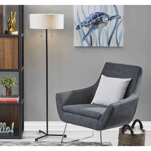 Wesley 60-Inch Floor Lamp Black Modern Tall Floor Lamp With Dual 60W Sockets next to gray chair and turtle painting