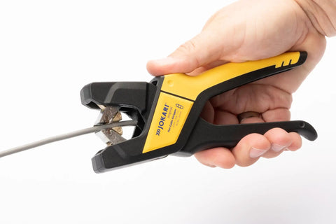Alt Tag: Ergonomic Automatic Flat Cable Stripper For PVC Insulated Cables, Slick External Sheathing And Clean Internal Insulation Removal in use