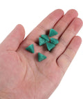 Hand holding small Three Usable Sides Triangular Resin Polishing Media Blocks For Metal Tumbling Machines Deburring And Finishing Supplies