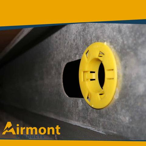 Top Shelf Plastic Stud Grommets For Metal Framing installed in steel stud, yellow polypropylene, protects wiring from sharp edges.