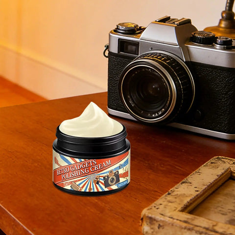 Phone Screen And Camera Lens Scratch Remover Paste 30ml jar next to vintage camera on wooden table