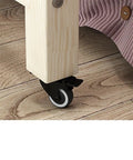Close-up of smooth lockable wheels on the Roomy Rollin Overbed Laptop Desk Featuring Sturdy Guard Rail And Smooth Lockable Wheels Solid Wood Bedside Tray Ideal For Remote Workers Who Need A Chill Mobile Workspace Setup.