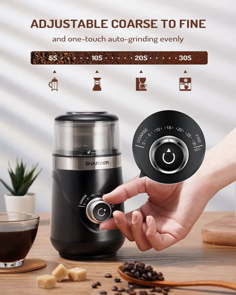 Electric Super Silent Blade Coffee Grinder With Timed Grind Control Rotary Knob on table with coffee beans