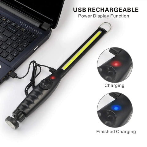 Rechargeable COB Work Light With 700 Lumens Magnetic Cordless LED charging via USB next to laptop, red and blue indicators.