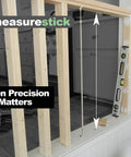 Extendable Measuring Stick Tool For Woodworking And Remodeling With Pinch Action 47 Inch Reach shown in trim measuring