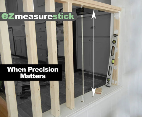 Extendable Measuring Stick Tool For Woodworking And Remodeling With Pinch Action 47 Inch Reach shown in trim measuring
