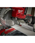 Close-up of Top Tier Dual Bevel Sliding Compound Miter Saw With Brushless Powerplant cutting a 10 inch board.