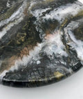 Close-up of Dope Geode Lazy Susan 15 Inch Serving Tray With Black And Gold Accent showcasing geode-inspired resin pattern.