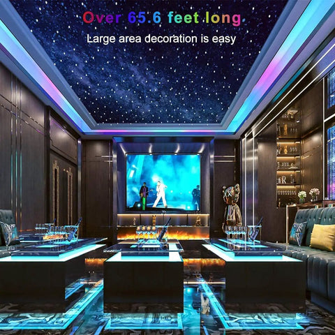 Modern living room with All In One 65.6Ft RGB LED Strip Lights Kit creating a vibrant ceiling and decor