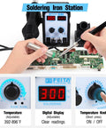 Hands using 2 In 1 SMD Hot Air Rework Station With Digital Soldering Iron And Heat Gun Includes 5 Solder Tips Kit