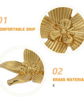 Close-up of Brushed Brass Five-Leaf Flower Cabinet Knob And Dresser Pull For Wardrobe Drawers, Vintage Furniture Hardware For Bathroom And Kitchen Cabinets, Ergonomic Grip, Go-To Sleek Floral Design highlighting brass material.